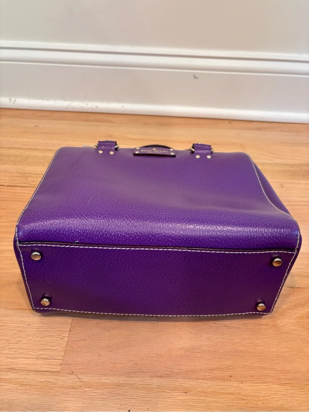 Kate Spade Alessa Wellesley handbag in a vibrant plumberry purple leather